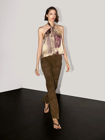 Pantalon flare en cuir finition daim