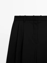 100% extra fine wool pleated trousers