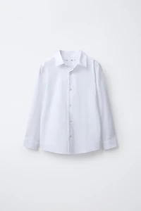 CHEMISE UNIE HABILLÉE