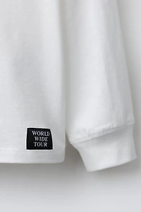 T-SHIRT À INSCRIPTION EN RELIEF