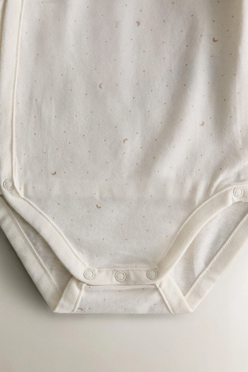 SET OF CHILDREN'S MOON BODYSUITS