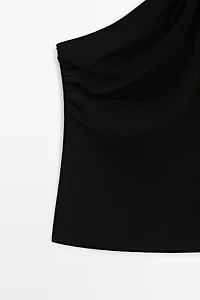 Top asymétrique détail métallique