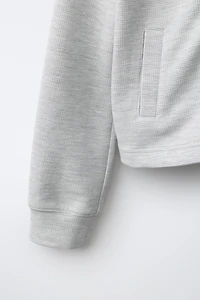 VESTE DE GYM AVEC CAPUCHE WAFFLE