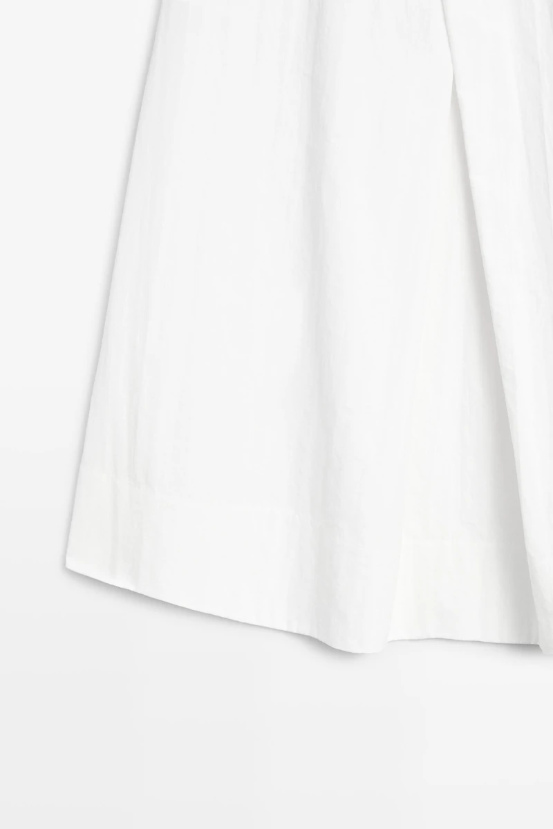 Midi skirt with yoke and pleated detail