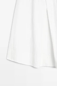 Midi skirt with yoke and pleated detail