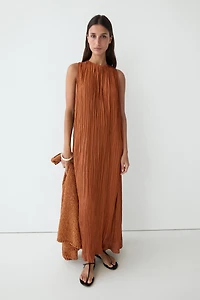 Long pleated halterneck dress