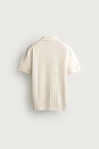 POLO EN MAILLE STRUCTURÉE AJOURÉE