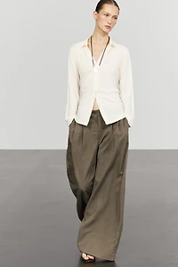 Pantalon wide leg fluide technique à plis