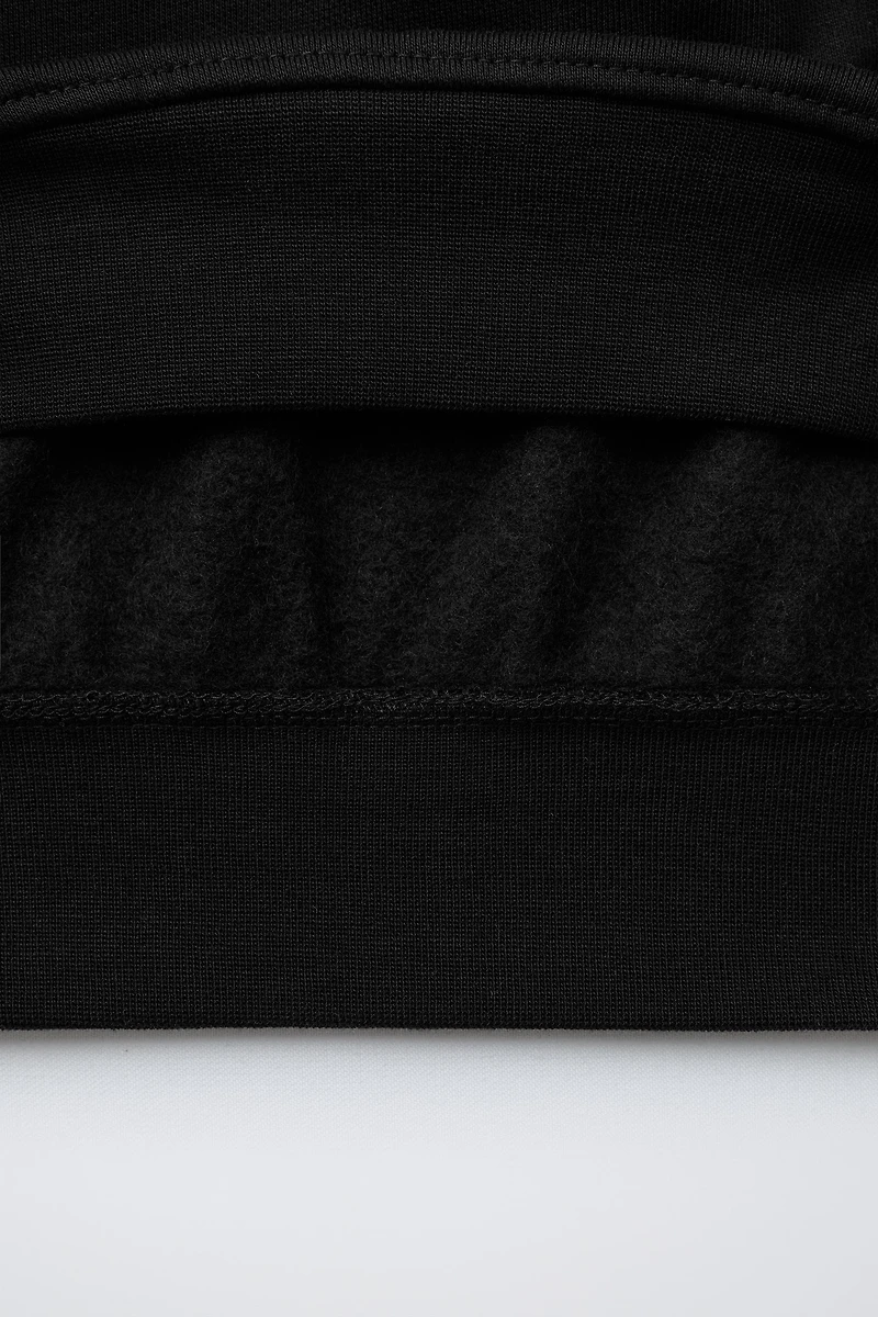SWEAT BASIQUE À INSCRIPTION