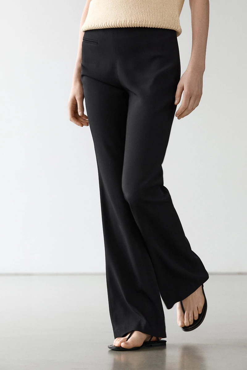 Flared trousers with pocket