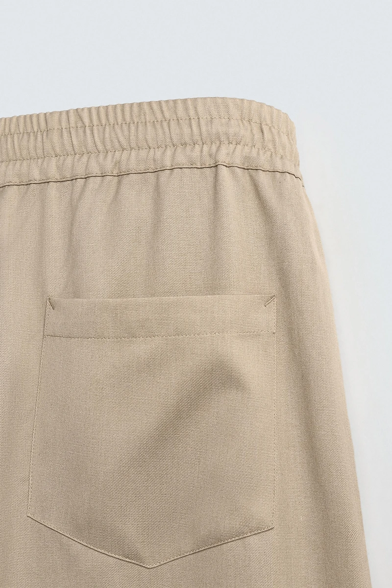 PANTALON BALLON FIT À PLIS