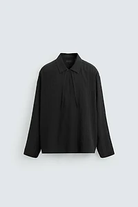 CHEMISE POLO STRUCTURÉE SEMI-TRANSPARENTE
