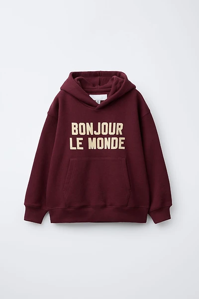 FLOCKED TEXT SWEATSHIRT