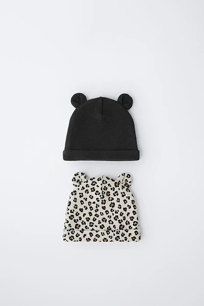 TWO-PACK OF WAFFLE KNIT EAR HATS WITH ANIMAL PRINT