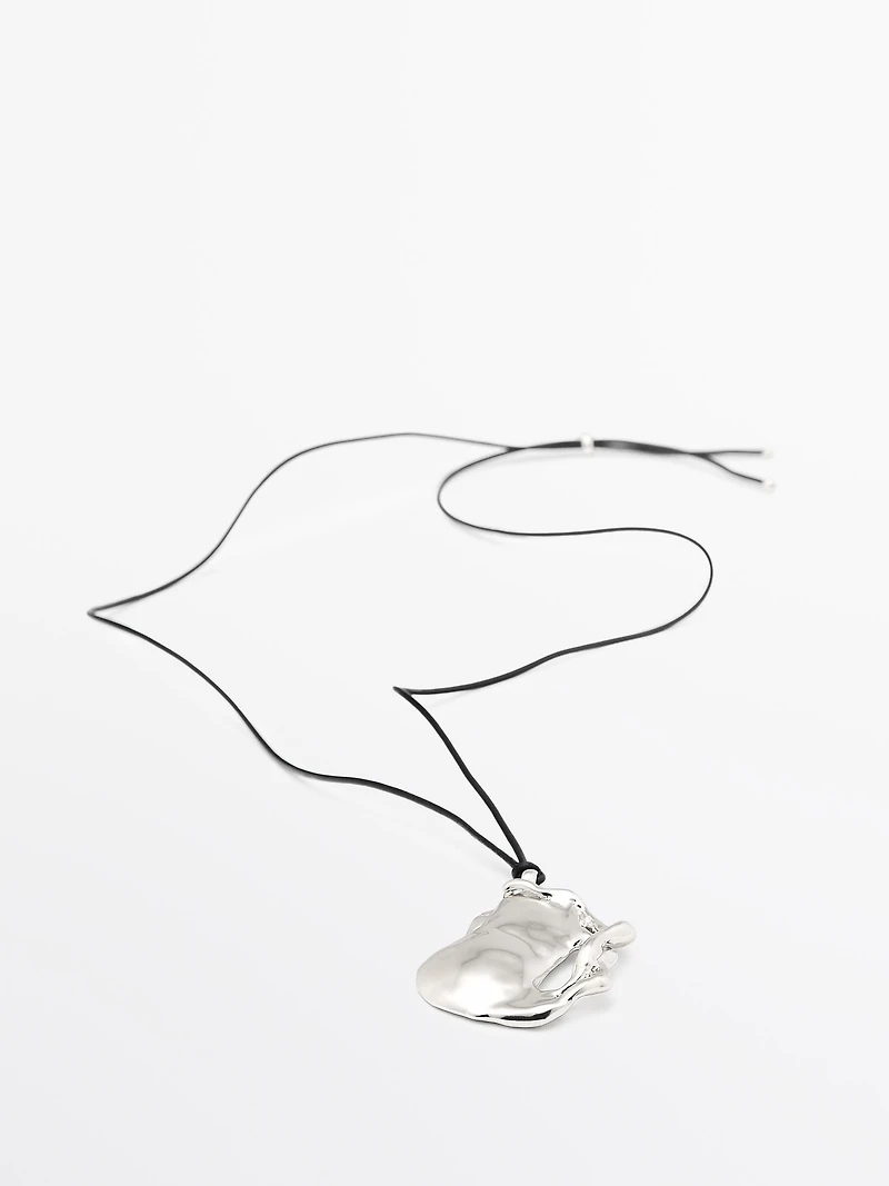 Pendentif pièce abstraite