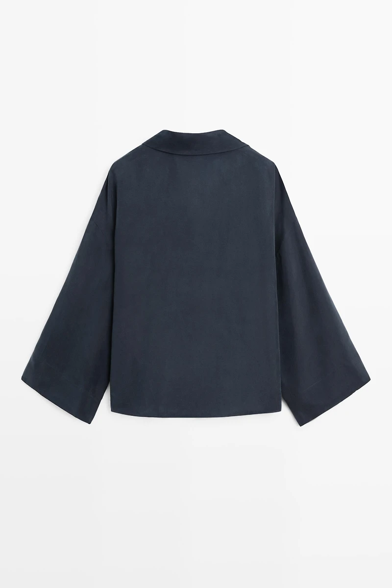 Flowing gathered wrap blouse