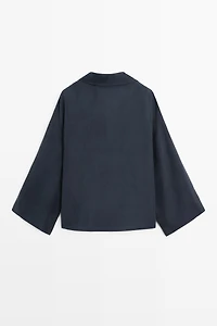 Flowing gathered wrap blouse