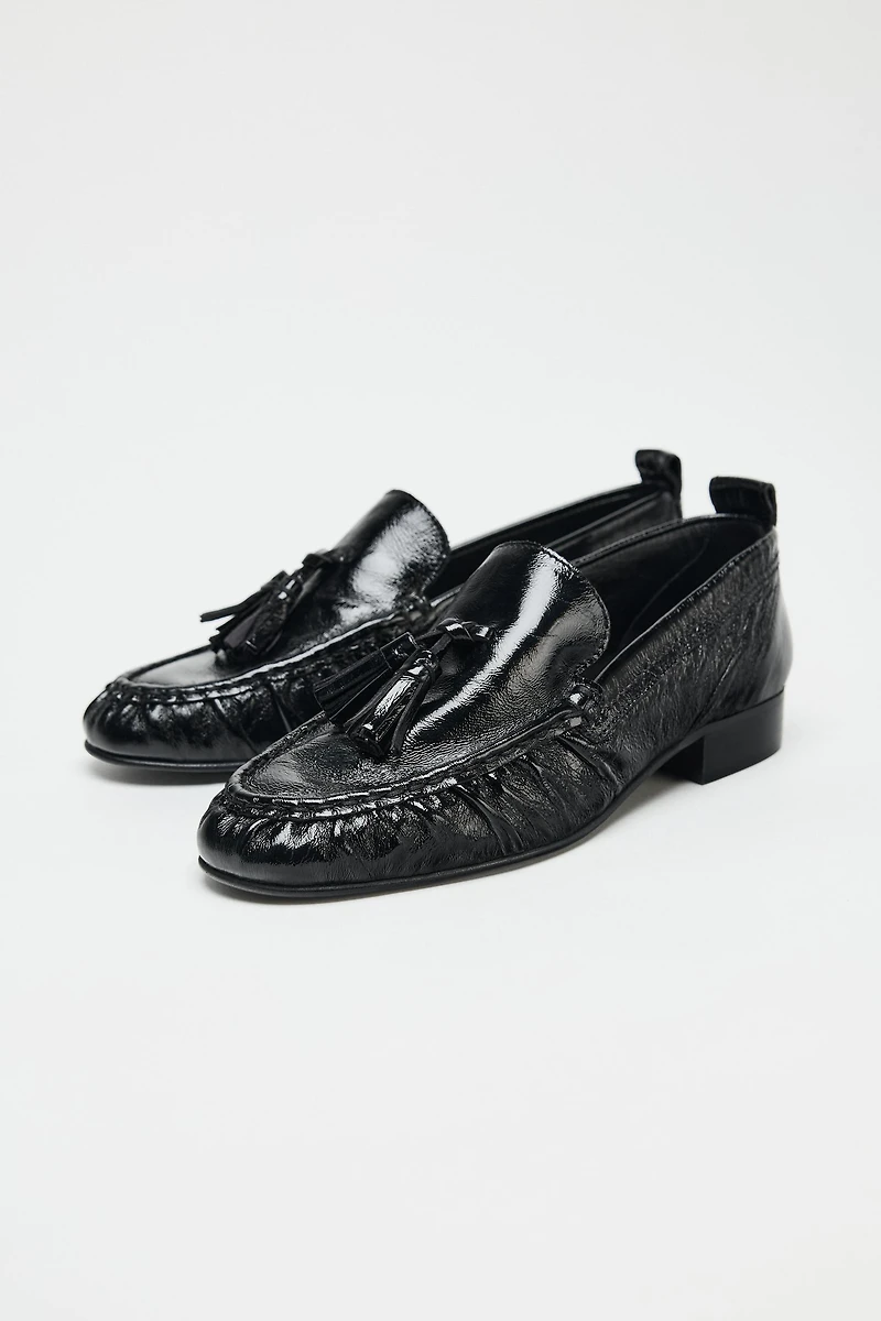 GATHERED TASSEL LEATHER LOAFERS