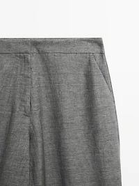 Balloon fit trousers with button details