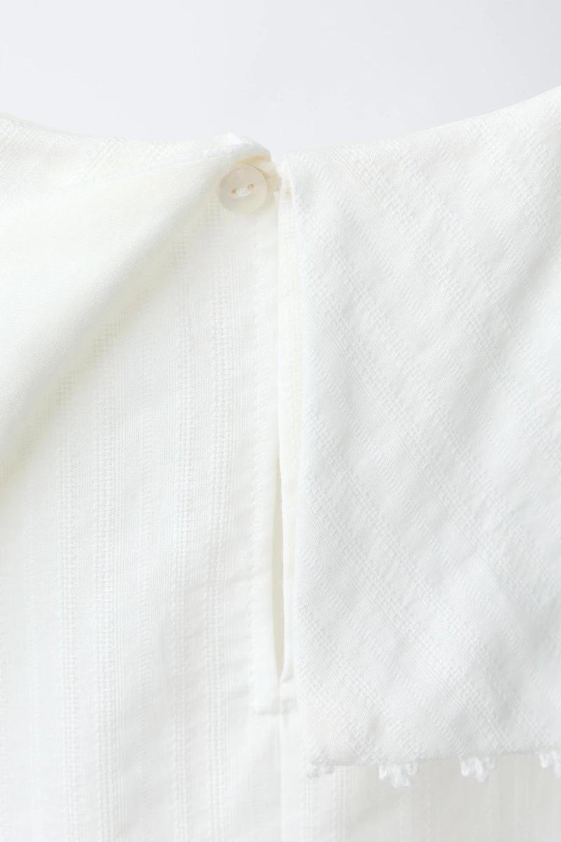 CHEMISE EN PLUMETIS À COL CLAUDINE