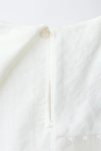 CHEMISE EN PLUMETIS À COL CLAUDINE