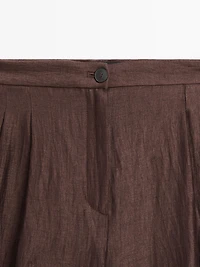 Wide-leg mid-rise crinkle trousers