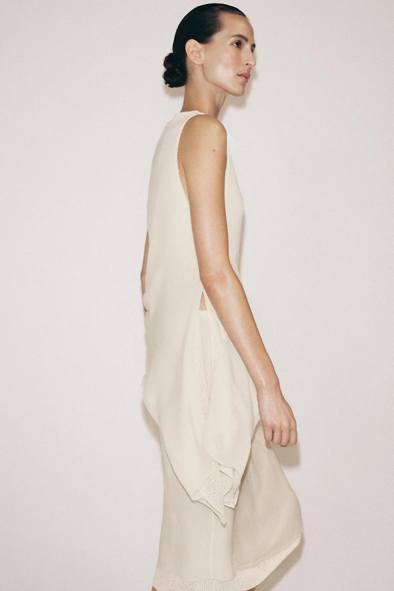 ASYMMETRIC SLEEVELESS TOP