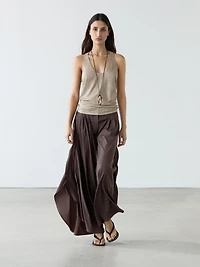 Wide-leg pleated trousers with side vents