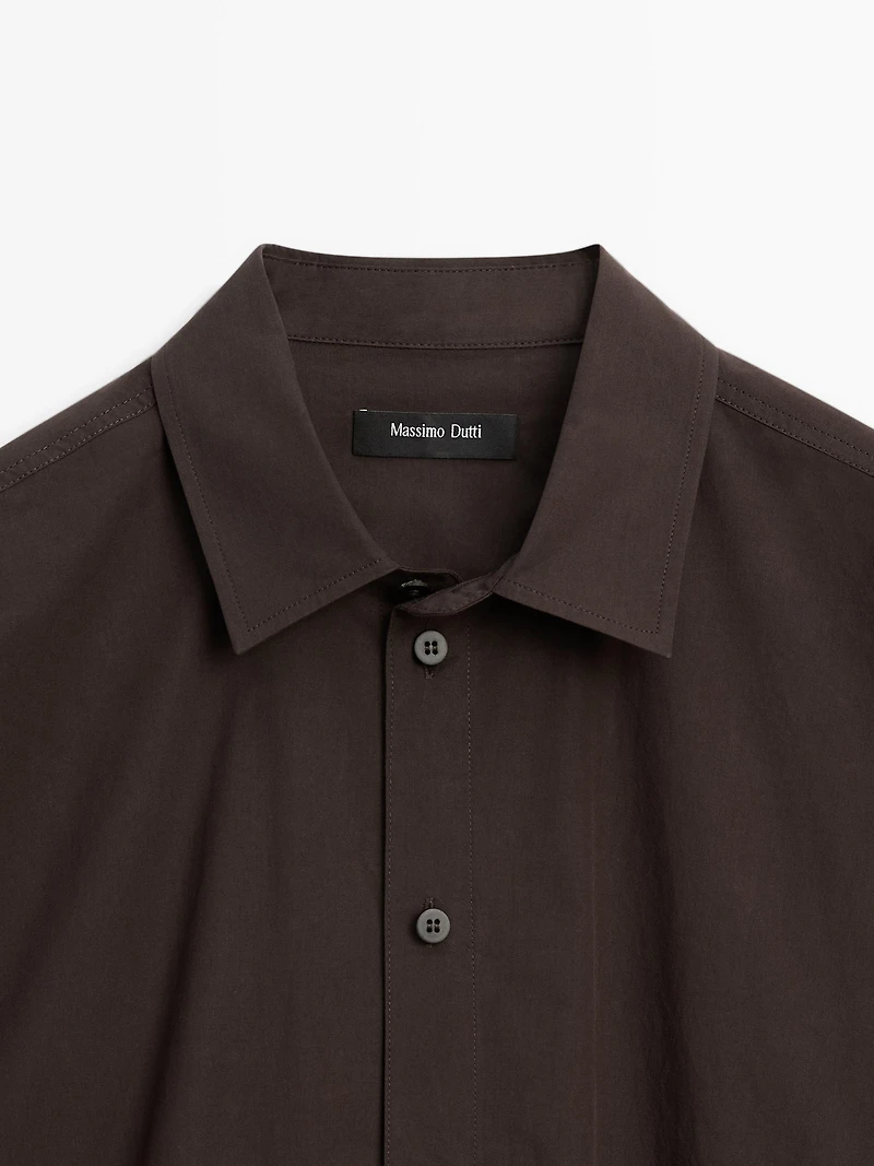 Asymmetric button-up poplin shirt