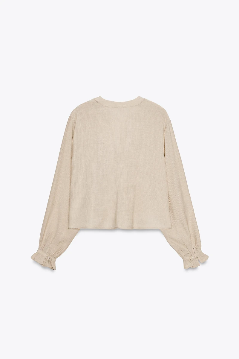 SHORT EMBROIDERED EYELET BLOUSE