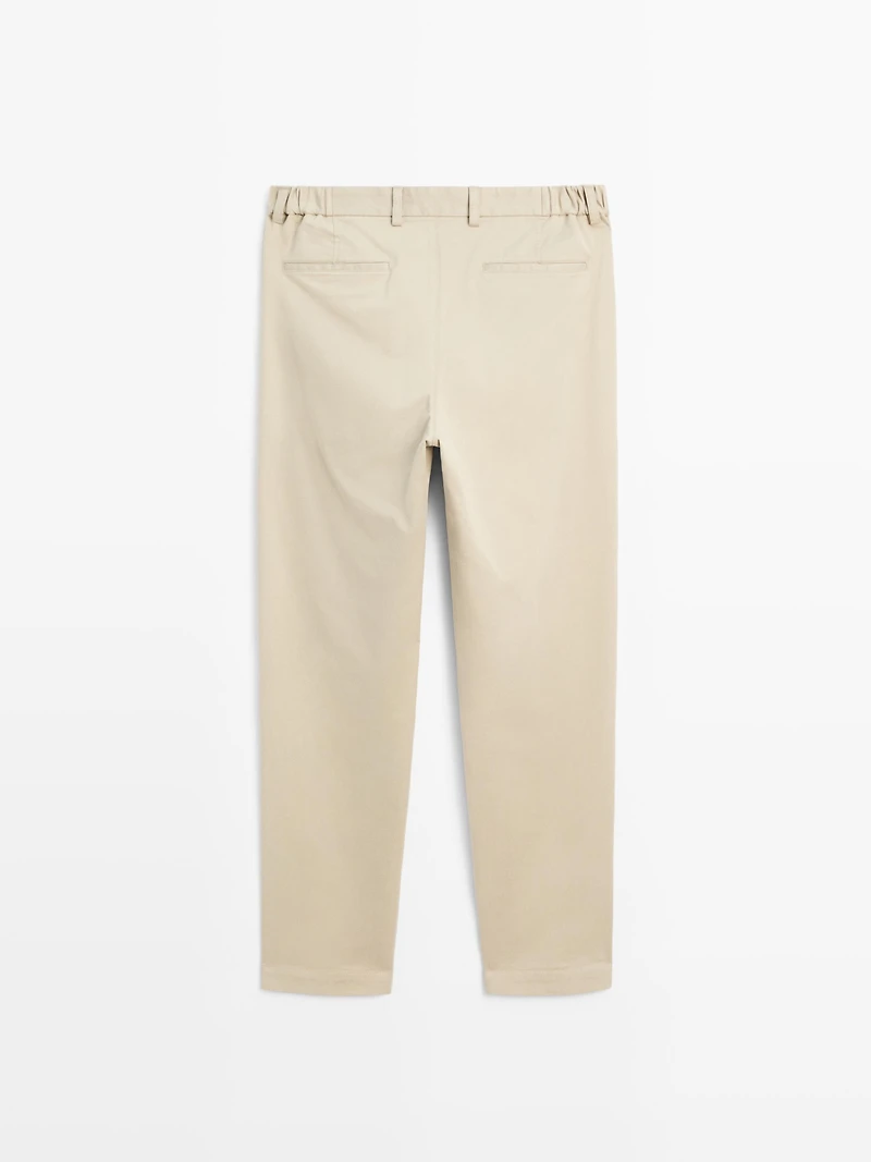 Slim fit trousers with elastic side detail