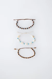 THREE-PACK OF BEADED SHELL BRACELETS