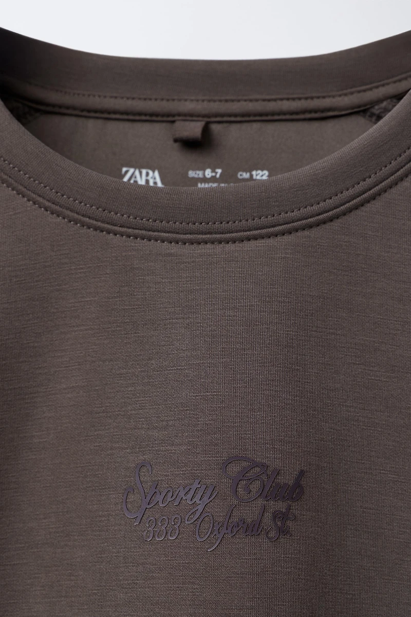 SPORTY RAISED TEXT SWEATSHIRT