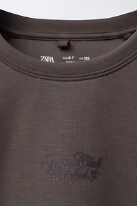 SPORTY RAISED TEXT SWEATSHIRT