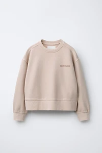 WASHED EFFECT TEXT SWEATSHIRT