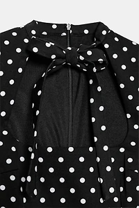 ROBE COURTE À NŒUD ET POIS