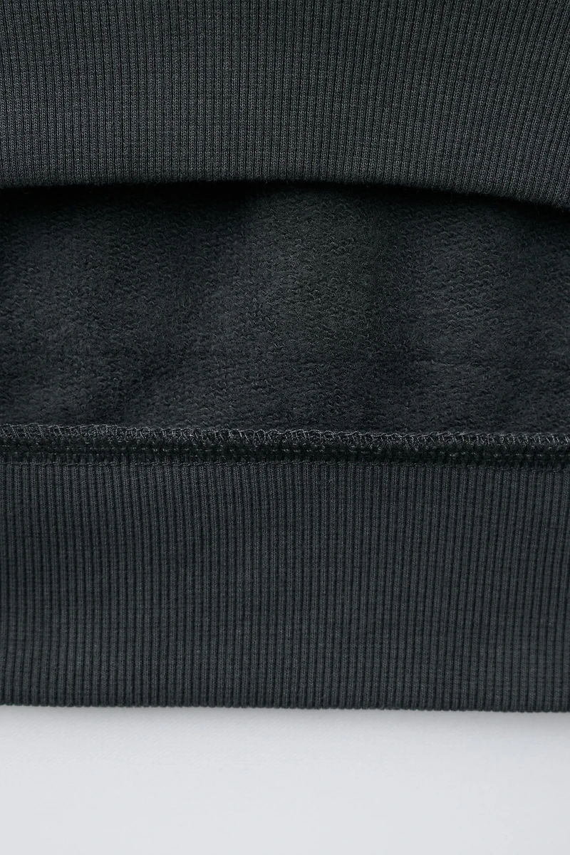 SWEAT À CAPUCHE BRODERIES