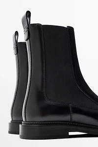 Flat leather Chelsea ankle boots