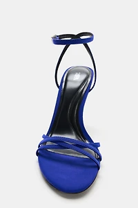 CRISS-CROSS STRAP HEELED SANDALS
