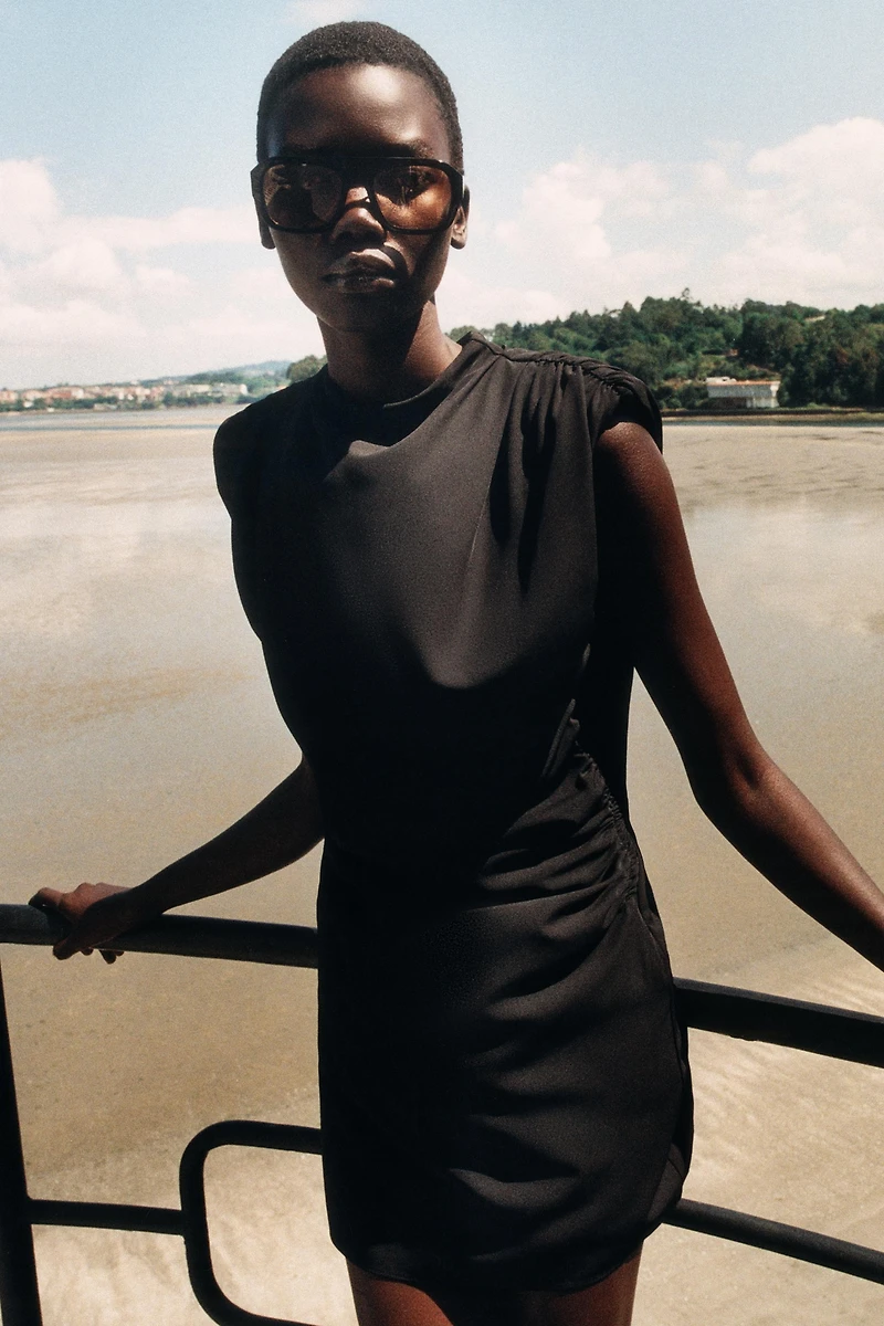 DRAPED MINI DRESS WITH SHOULDER PADS