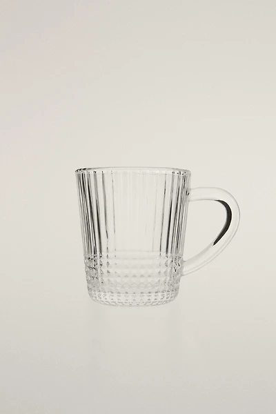 GLASS MUG WITH A RAISED GEOMETRIC DESIGN