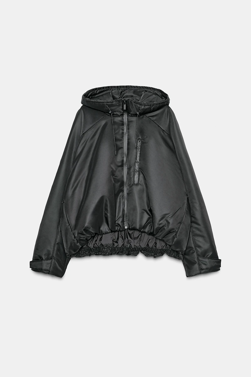 VESTE MATELASSÉE À CAPUCHE DÉPERLANTE ET COUPE-VENT