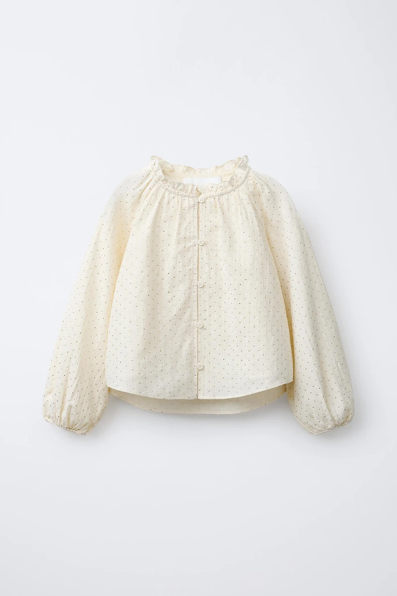 BLOUSE À CLOUS