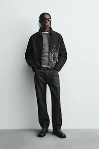 VESTE COURTE À PAILLETTES