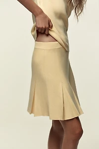 BOX PLEAT KNIT MINI SKIRT