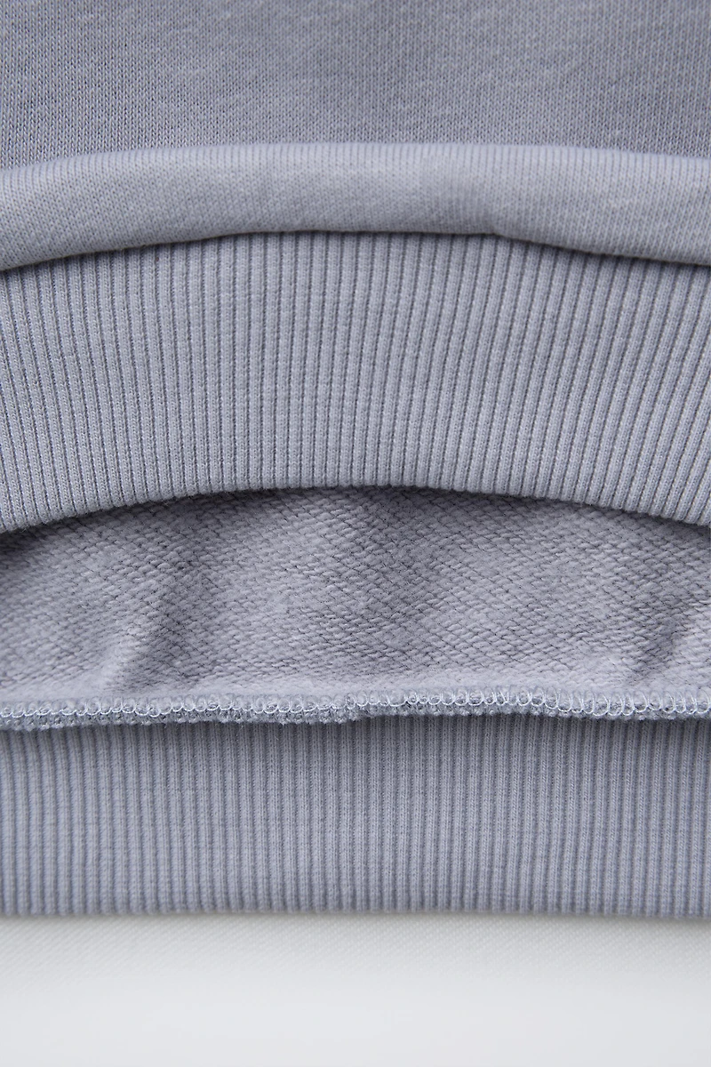 HEART POCKET SWEATSHIRT