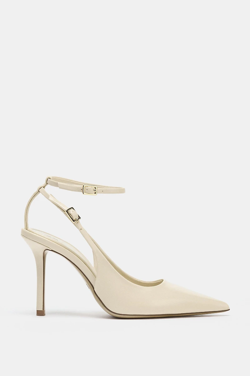CHAUSSURES OUVERTES À L'ARRIÈRE AVEC BOUCLES