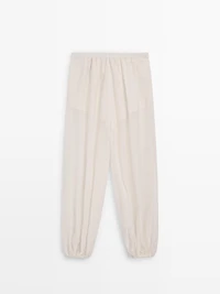Flowing sarouel trousers with pleated detail
