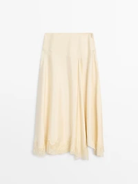 Asymmetric skirt with lace-trimmed detail