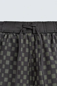 MAILLOT DE BAIN LONG À CARREAUX